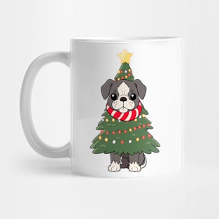 A Cute Puppy Wearing A Christmas Tree Mug
